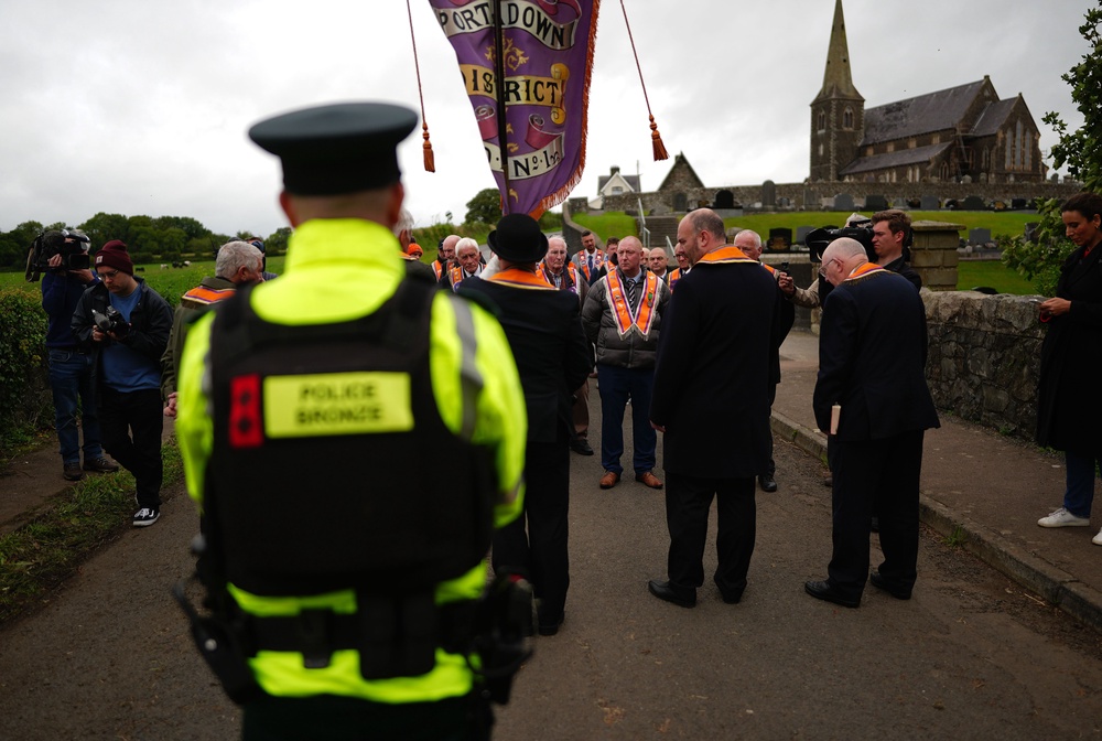 Orangemen at a police barricade close to Drumcree Church (Brian Lawless/PA) (PA Wire)