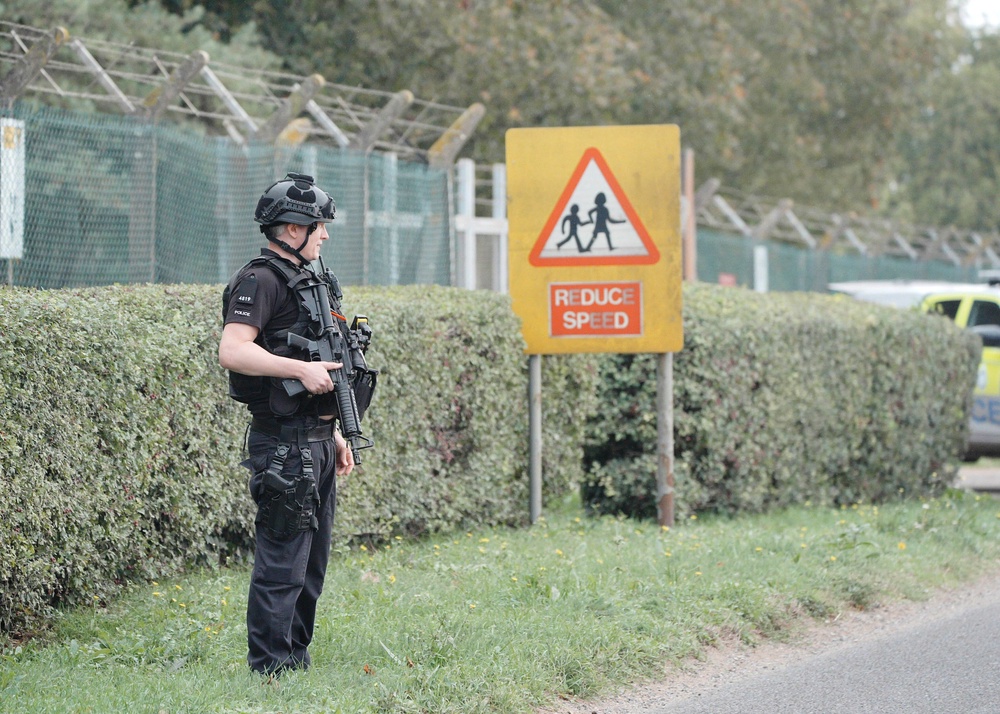 Police at a road block on the road to RAF Fairford after five people were arrested (Ben Birchall/PA) (PA Wire)