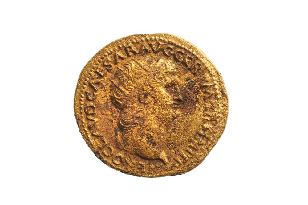 A coin of the Emperor Nero depicting Rome’s vast Macellum Magnum marketplace (London Museum/PA)