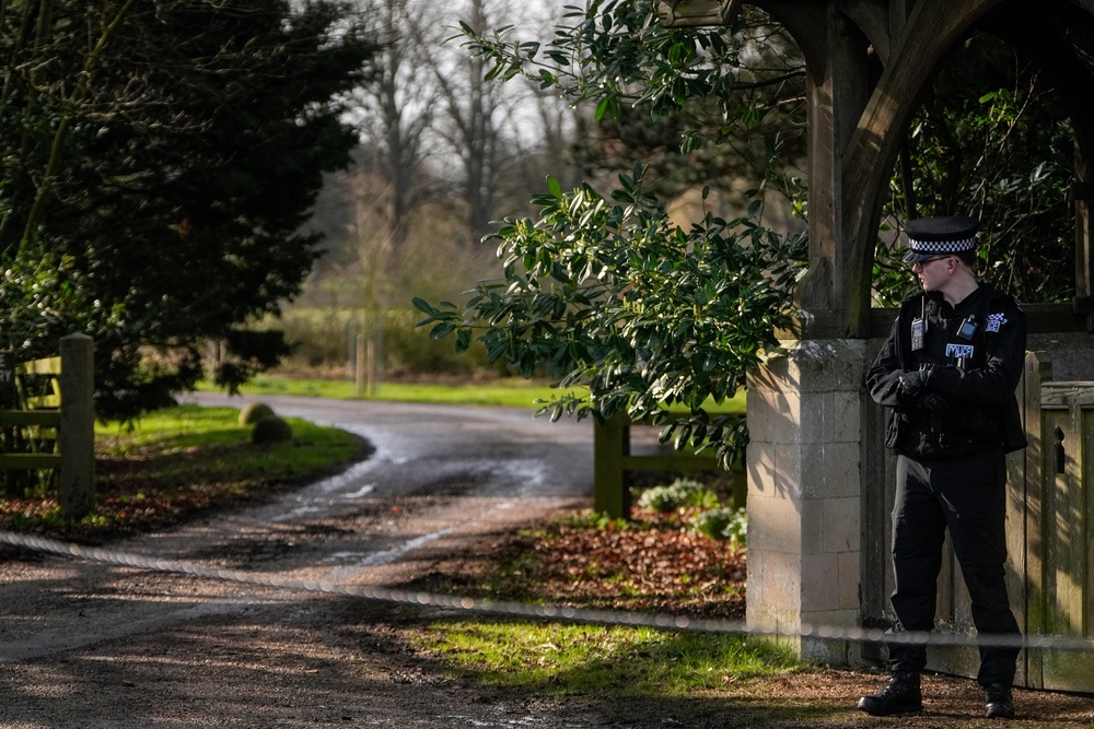 A policeman stands guard at an entrance to Wood Farm on the royal family's Sandringham Estate in Norfolk in February (AFP/Getty)