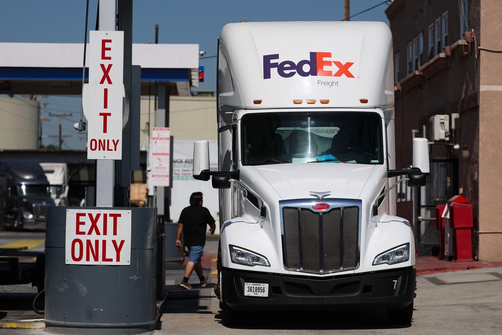 FedEx and other shippers acted as a tariff middleman between small businesses and the government (AFP via Getty Images)