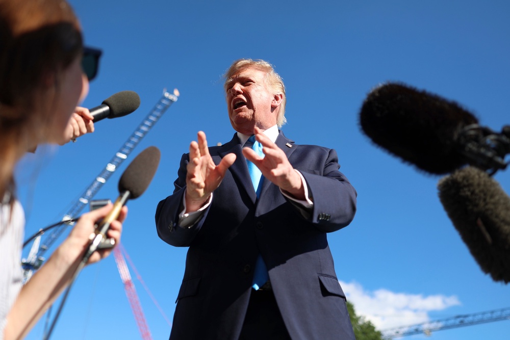 Donald Trump speaks to reporters on Monday (AP)