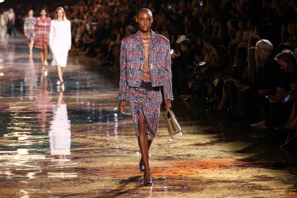 Low-rise midi skirts were paired with jackets and bare stomachs (Thomas Padilla/AP) (AP)