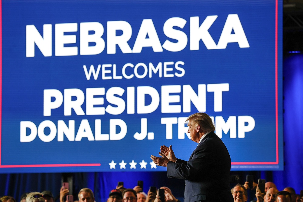 ‘They've tried to smear us, to slander us, to persecute us, and demoralize us,’ Trump said about the media while visiting the Nebraska State Fairgrounds in Grand Island Monday night (Getty Images)