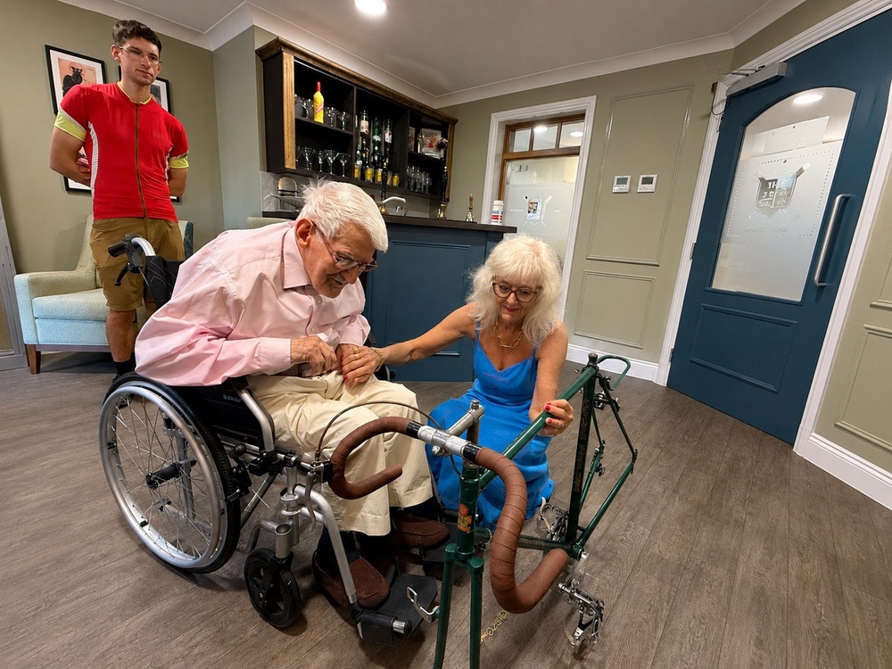 Clifford Craske, 96, is joined by his daughter Alice Craske, 67, as he is reunited with his beloved Claude Butler bicycle. (Care UK/ PA)
