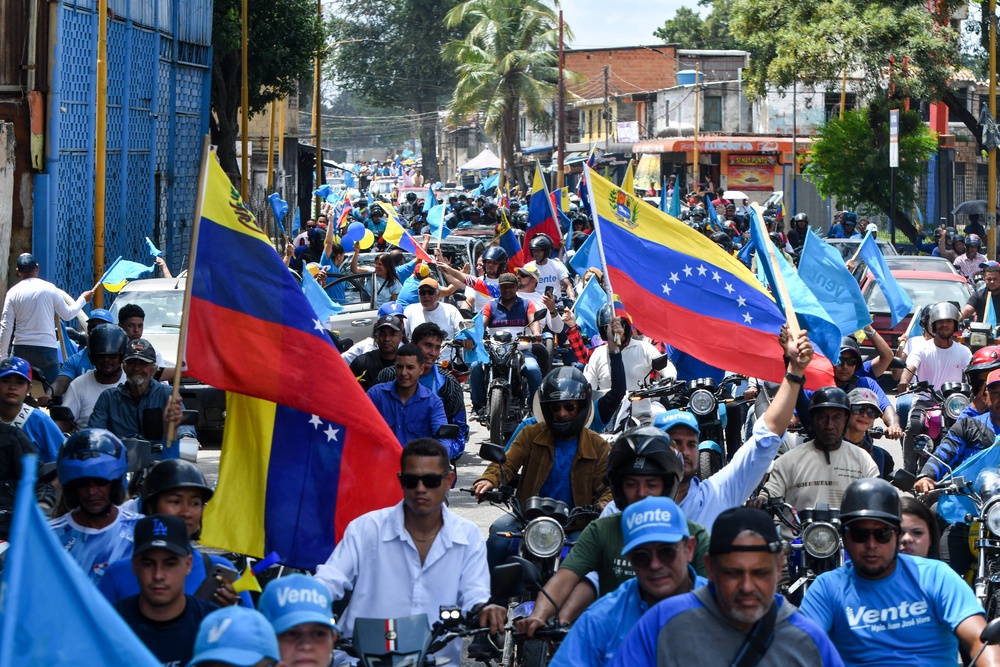 Demonstrators attend a rally to demand the return of  Machado (AFP/Getty)