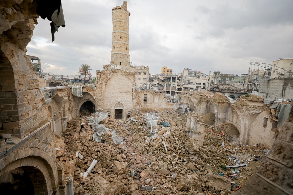 The heavily damaged structure and exposed courtyard of the Great Omari Mosque after sustaining major direct hits (AFP/Getty)
