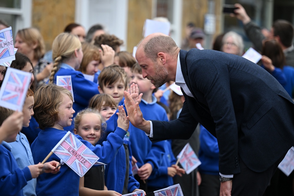 William met young people and community leaders at Sweet Surprise cafe (Finnbarr Webster/PA) (PA Wire)