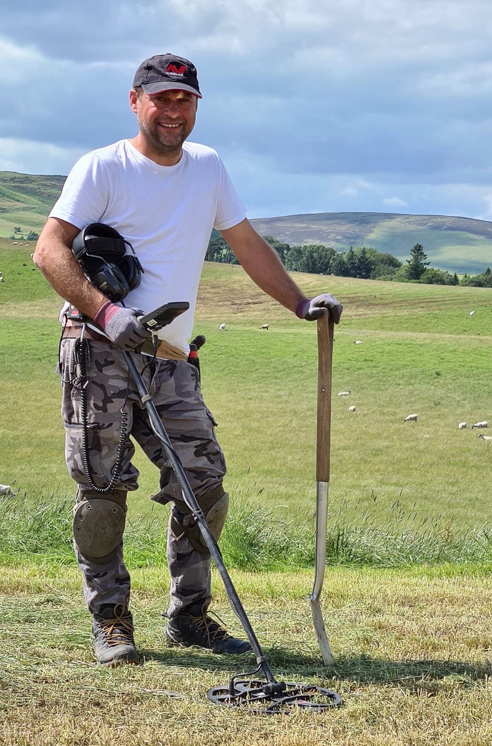 Metal detectorist Mariusz Stepien at an excavation near Peebles, after he found objects believed to be decorative and functional pieces of a Bronze Age harness (PA)