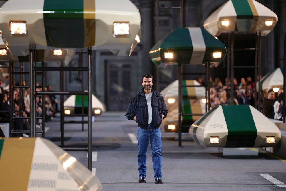 Designer Nicolas Ghesquiere accepting applause after the Louis Vuitton show (Aurelien Morissard/AP) (AP)