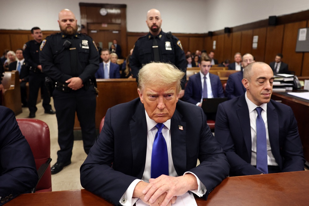 President Donald Trump, then running for re-election, is seen next to defense lawyer Emil Bove, now a federal appeals judge, during the 2024 Stormy Daniels ‘hush money’ trial in New York City, where he was convicted on 34 counts of falsifying business records (AFP/Getty)