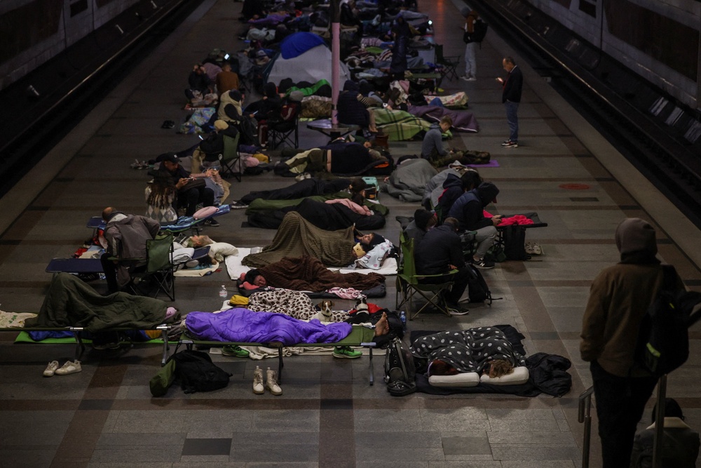 People take shelter inside a metro station during a Russian missile strike, amid Russia's attack on Ukraine, in Kyiv (Reuters)