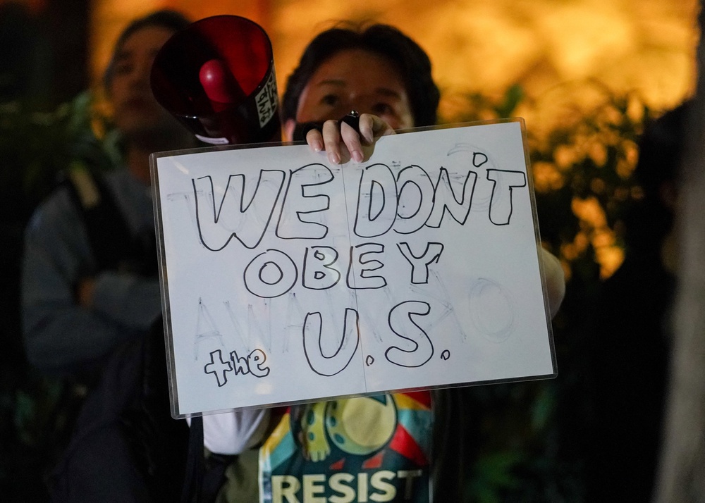 Protests have taken place outside the American embassy in Tokyo (AFP/Getty)