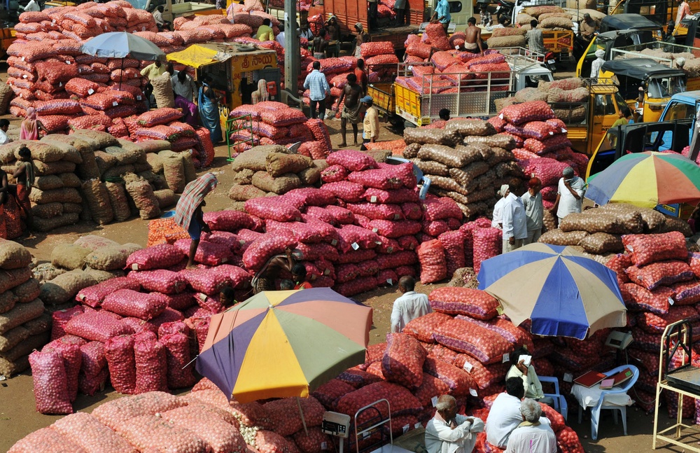 Indian farmers and traders dealing onions at a wholesale market in Hyderabad (AFP/Getty)