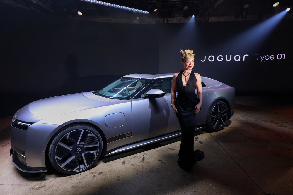 Florence Pugh with the Jaguar Type 01 in New York (Reuters)