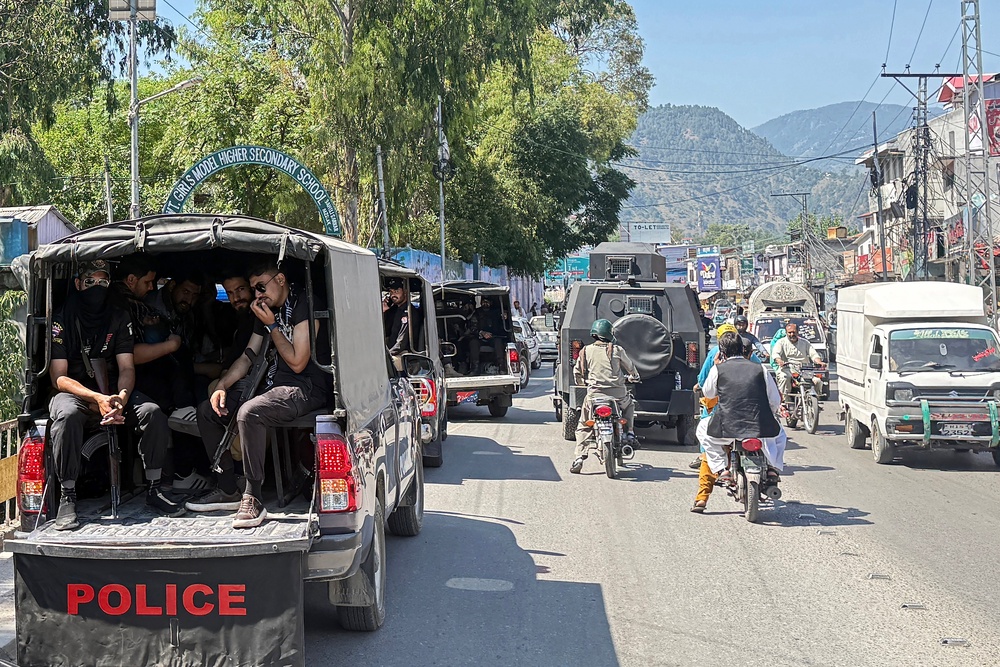 Security personnel patrol a street in Muzaffarabad, capital of Pakistan-administered Kashmir on 8 June 2026 on the eve of Joint Awami Action Committee (JAAC)'s anticipated rally (AFP/Getty)