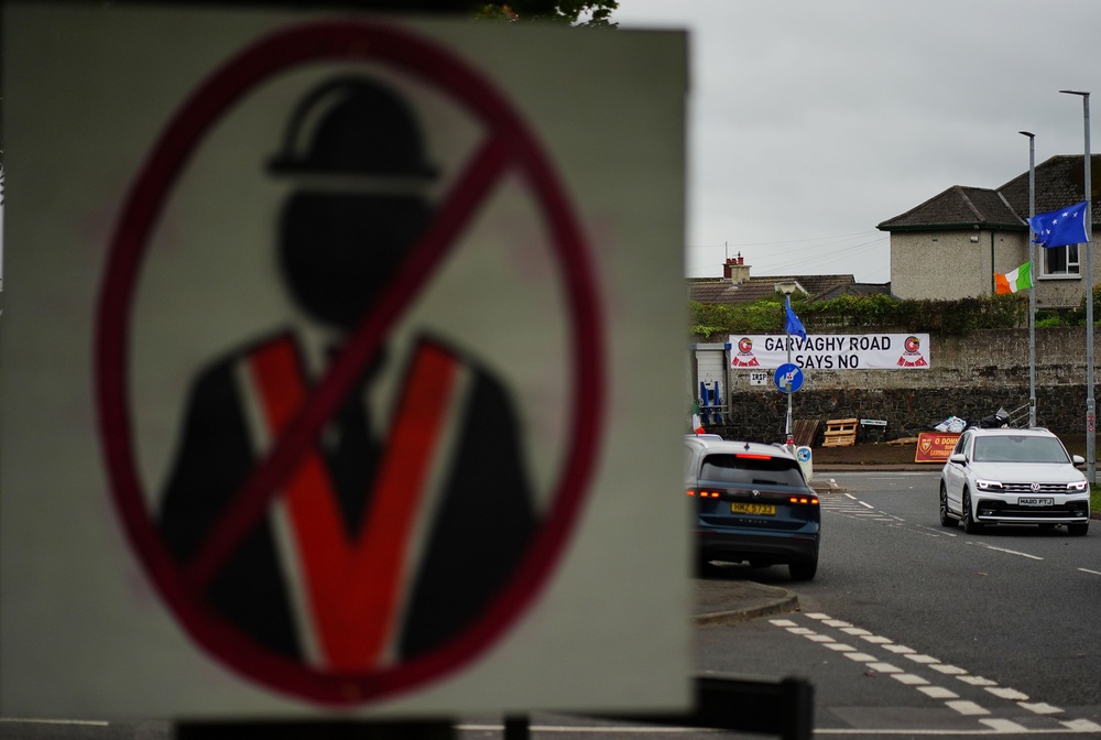 Flags and posters at the Garvaghy Road (Brian Lawless/PA) (PA Wire)
