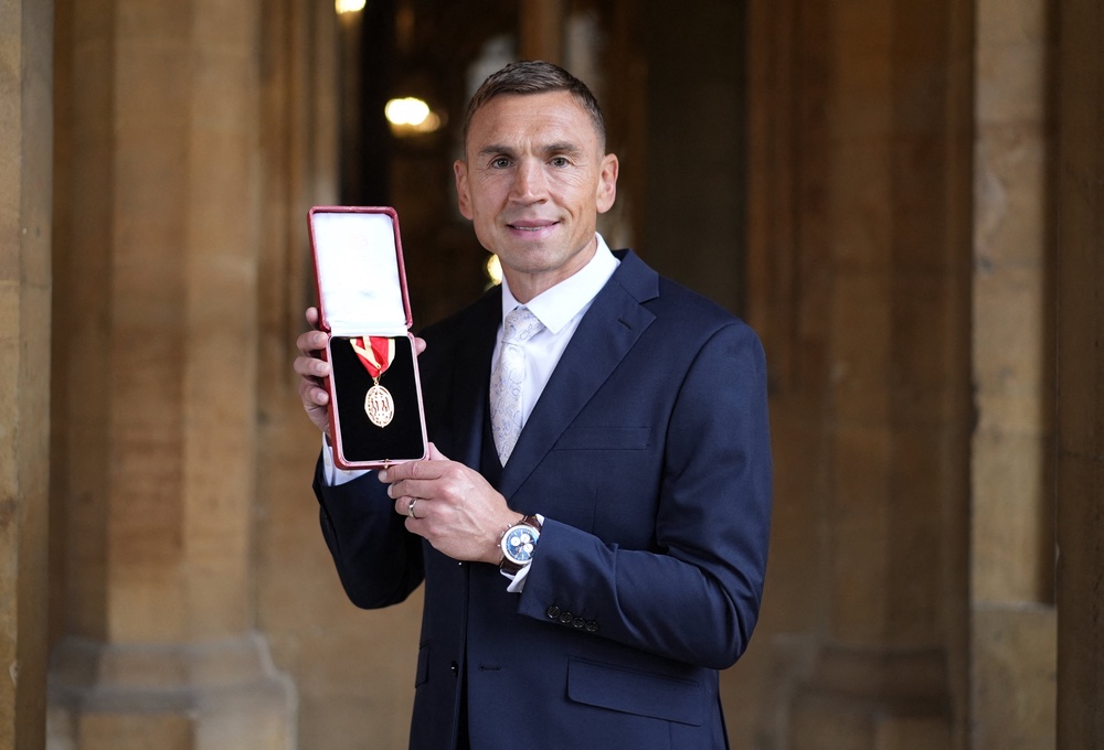 Sinfield poses with his medal (AFP/Getty)