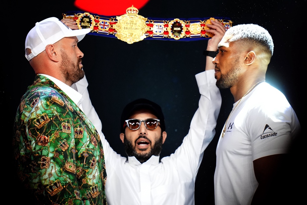 Tyson Fury (left) and Anthony Joshua face off (John Walton/PA) (PA Wire)