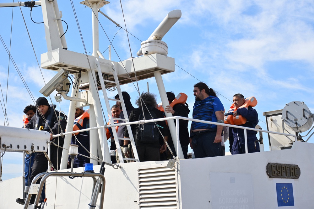 Crew members from a vessel struck by drones in Bulgaria's exclusive economic zone arrive at the port of Varna after being rescued on 6 October 2026 (AFP/Getty)