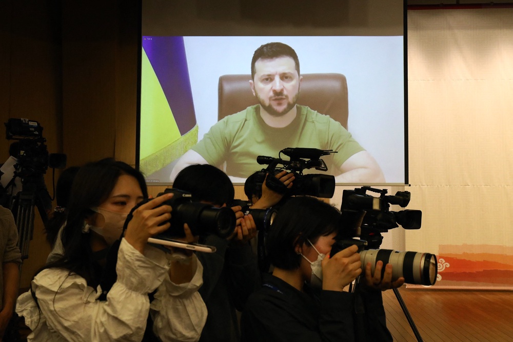 Ukrainian President Volodymyr Zelensky addresses South Korean parliamentary via video link at national assembly in Seoul (AFP/Getty)