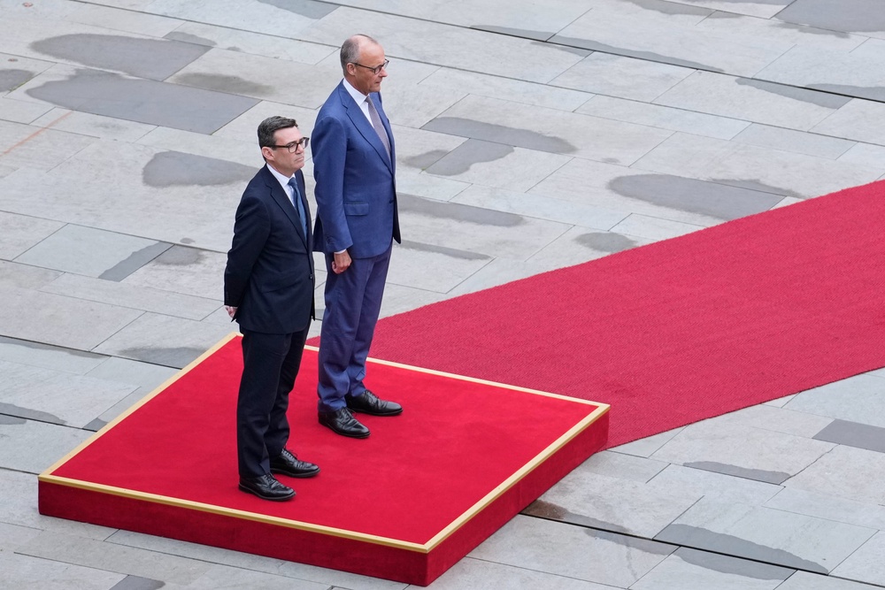 German Chancellor Friedrich Merz with Prime Minister Andy Burnham at the Chancellery in Berlin (Ebrahim Noroozi/AP) (AP)