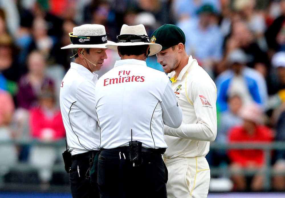 Bancroft is confronted by umpires on the field (Getty)