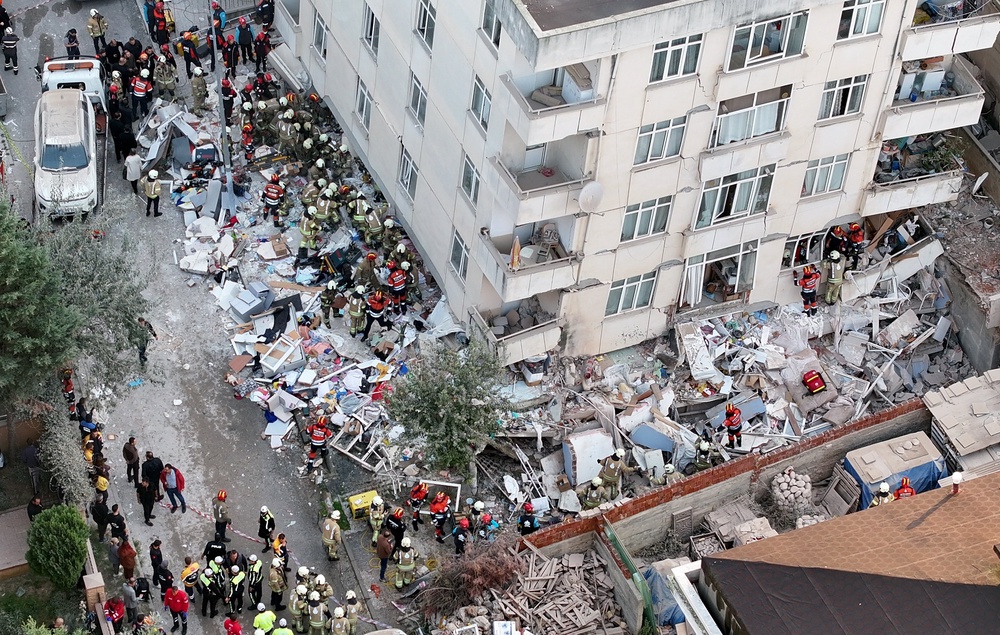 The block has partially collapsed, leaving several people trapped under massive amounts of rubble (Anadolu/Getty)