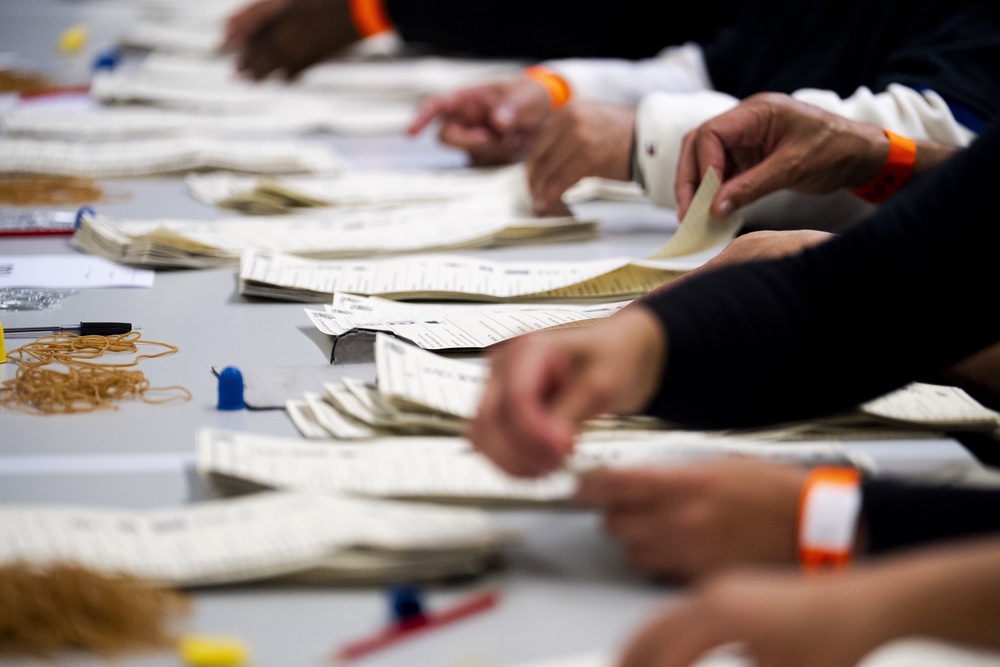 Ballot papers are counted by staff at the count for the Holborn and St Pancras by-election (Jordan Pettitt/PA) (PA Wire)