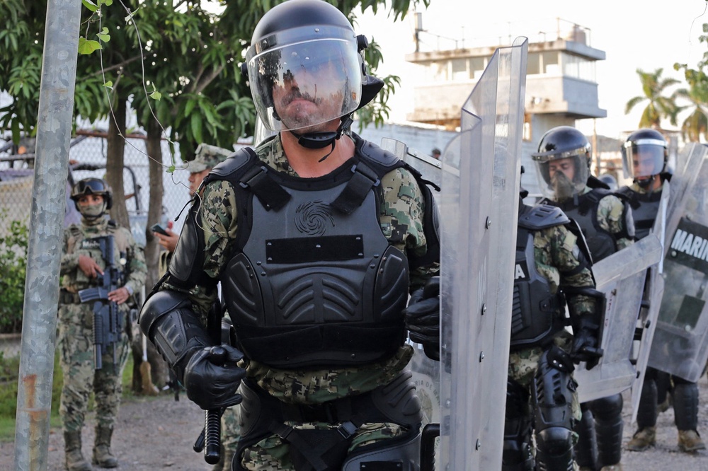 Members of the Mexican Navy stand guard outside El Castillo prison following reports of a riot at the facility in Mazatlan, Mexico (AFP/Getty)