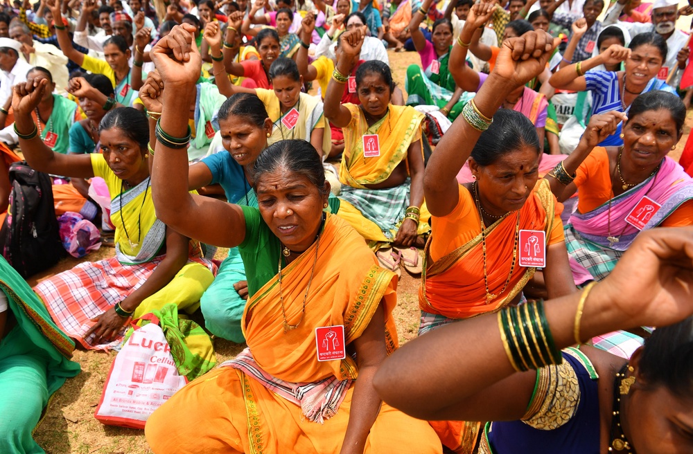 File. Farmers and villagers, who had to relocate from the areas along the proposed route of the  Mumbai-Ahmedabad high-speed rail corridor project, shout slogans during a protest in Mumbai on 17 May 2018 (AFP/Getty)
