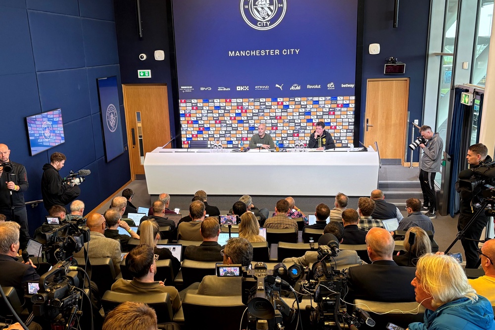 Enzo Maresca faces a crowded press conference at Manchester City (PA)