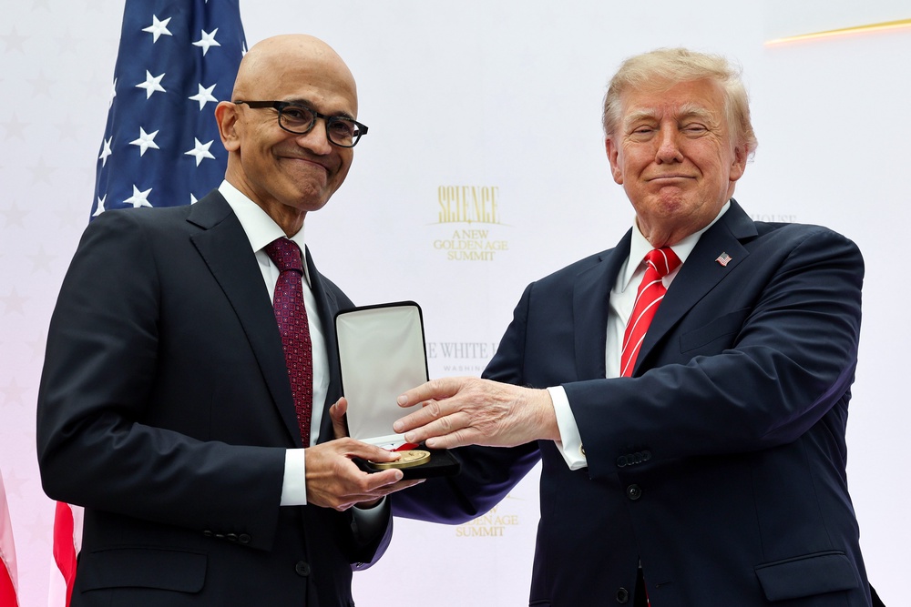 Microsoft CEO Satya Nadella (L) receives the National Medal of Technology and Innovation from U.S. President Donald Trump during the Golden Age of American Innovation Summit at the Institute of Peace on October 08, 2026 (Getty)