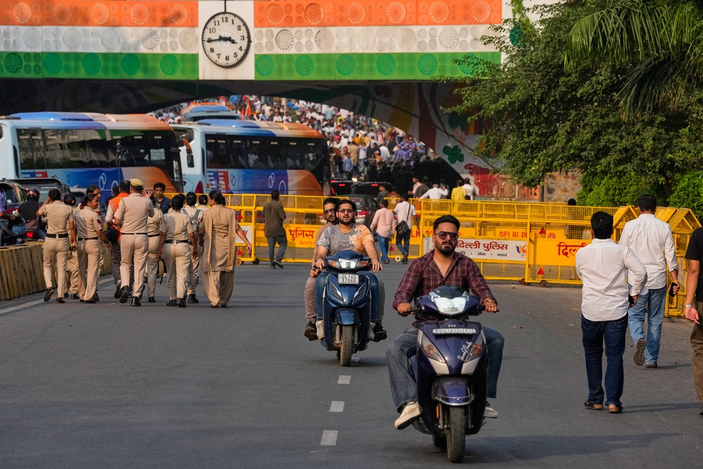 Opposition Congress party supporters march to demand the resignation of chief election commissioner Gyanesh Kumar in Delhi, India, on 8 October 2026 (AP)