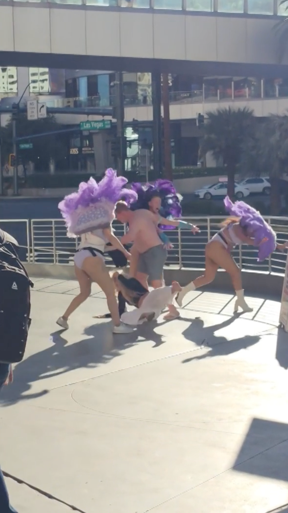 A male tourist lost his shirt during the brawl (Viral Press via Reuters Connect)