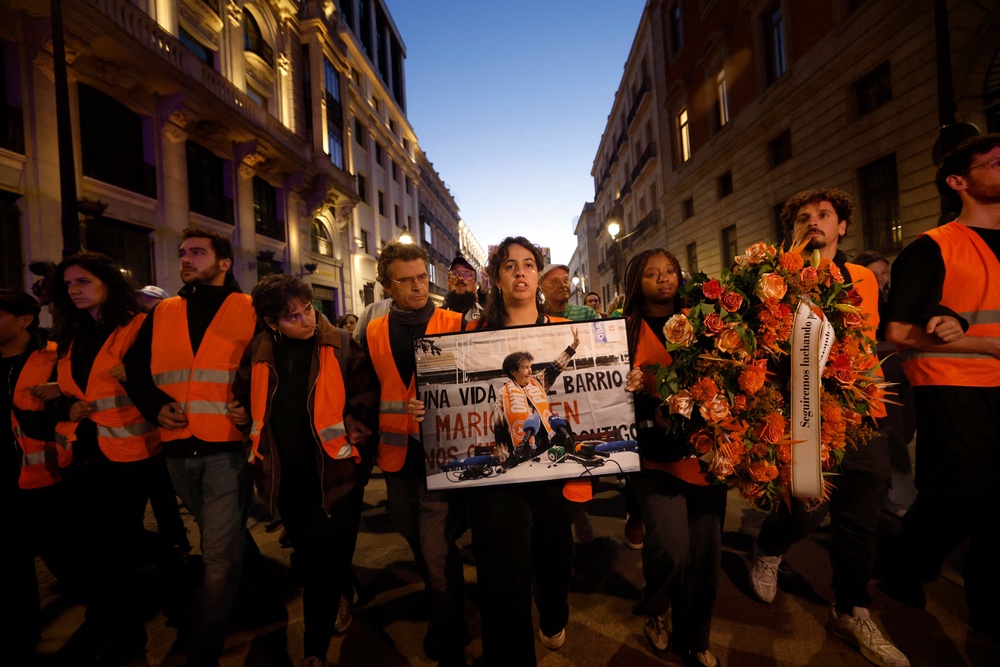 Thousands of Spaniards marched through central Madrid on Thursday to mark the death of the 87-year-old woman whose eviction from her home ignited protests across the country and led to a snap election next month (AFP/Getty)