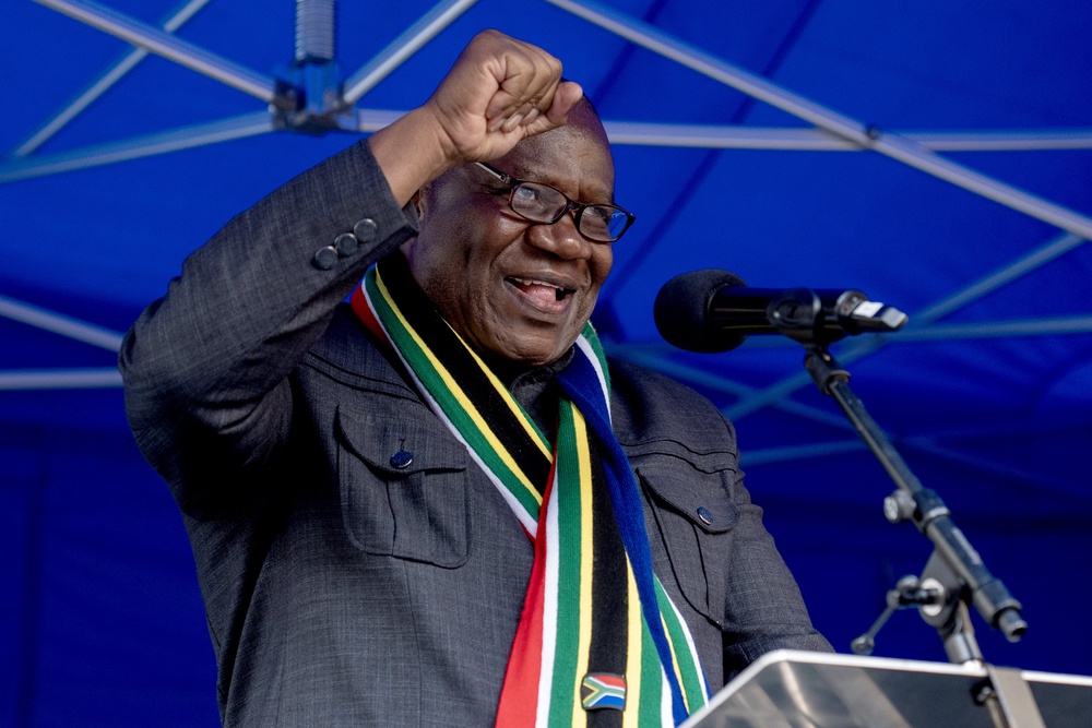 South African high commissioner to the UK Kingsley Mamabolo unveiled the statue (Jane Barlow/PA) (PA Wire)