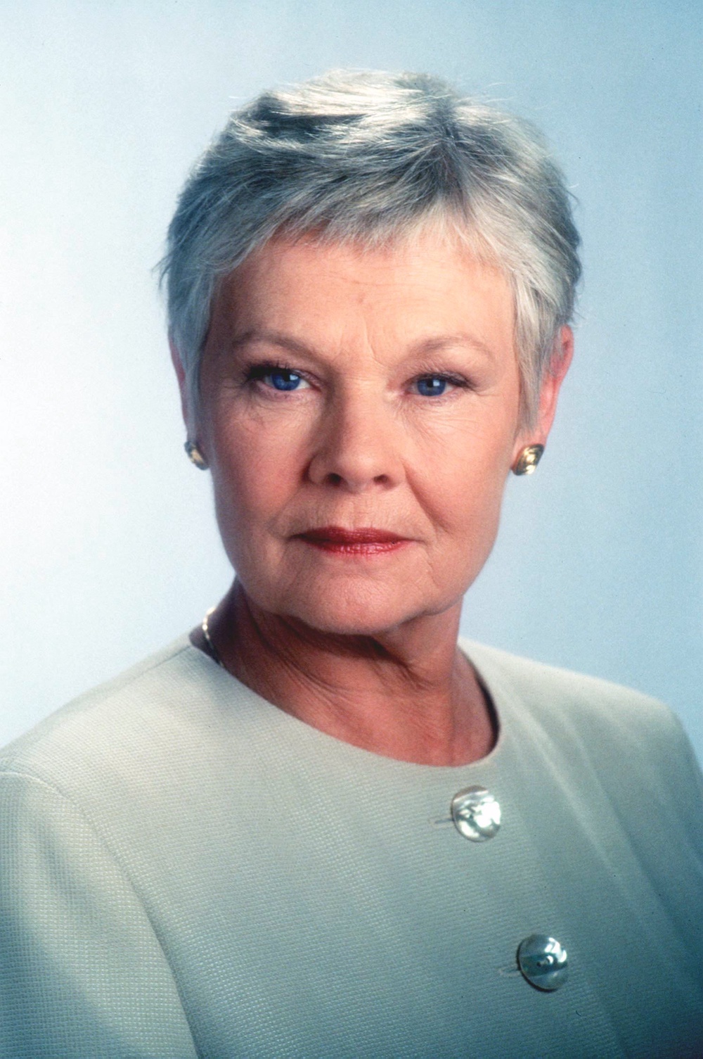 Dench as M in the 'challenging' Bond movie 'Tomorrow Never Dies' (PA)