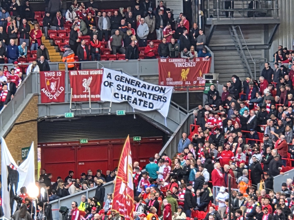 A banner displayed by Liverpool supporters at Anfield (Richard Jolly/The Independent)