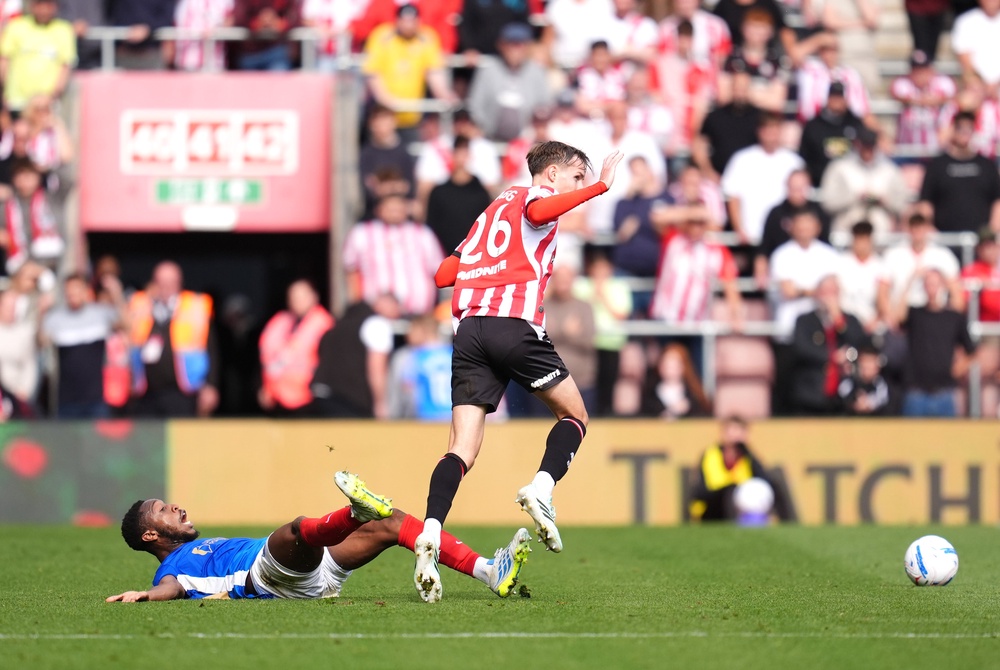 Southampton’s Cameron Bragg (right) fouls Portsmouth’s Ebou Adams and a second yellow card that led to his sending off (Adam Davy/PA).