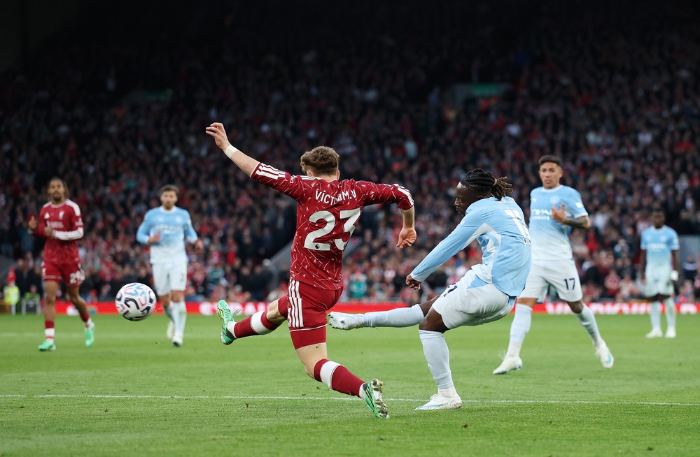 Jeremy Doku whips in the second goal for City (Getty)