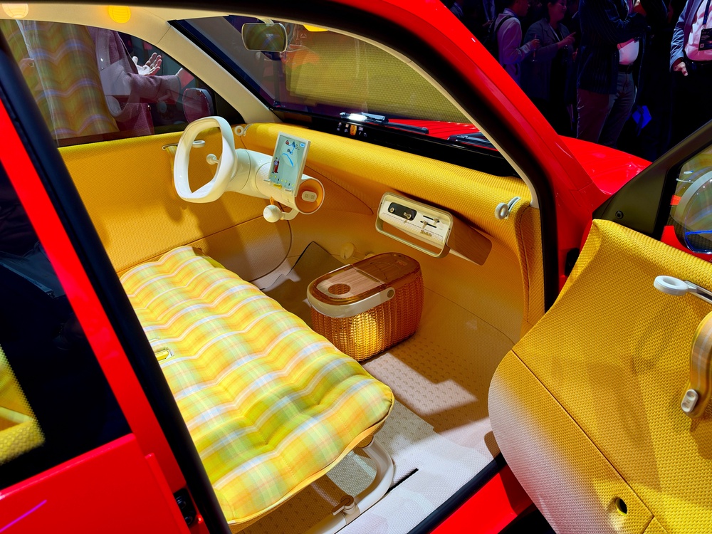 The interior of the new Citroen 2CV includes a detachable radio and a secure place to store eggs (Steve Fowler)