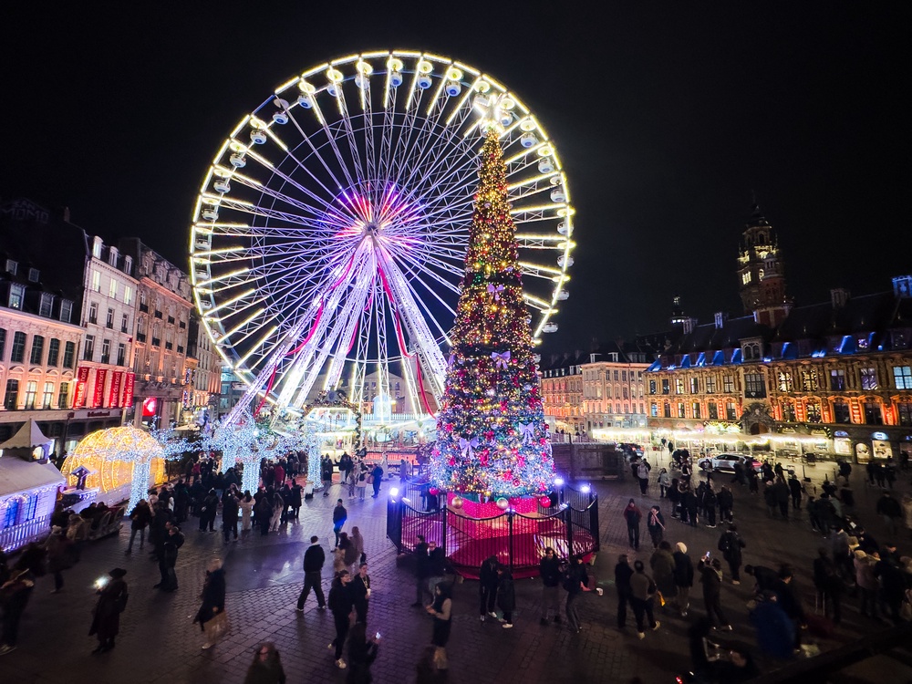 Lille Christmas market with its illuminated ferris wheel and large decorated Christmas tree on Grand Place in Lille in Hauts de France (AFP/Getty)