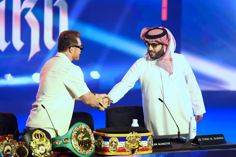Canelo Alvarez (left) with Saudi adviser and boxing matchmaker Turki Alalshikh (Getty)