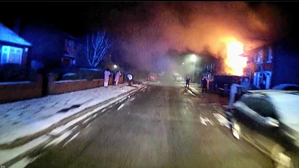 The Pearson family home on Jackson Street ablaze (Greater Manchester Fire and Rescue/Greater Manchester Police/PA) (PA Media)