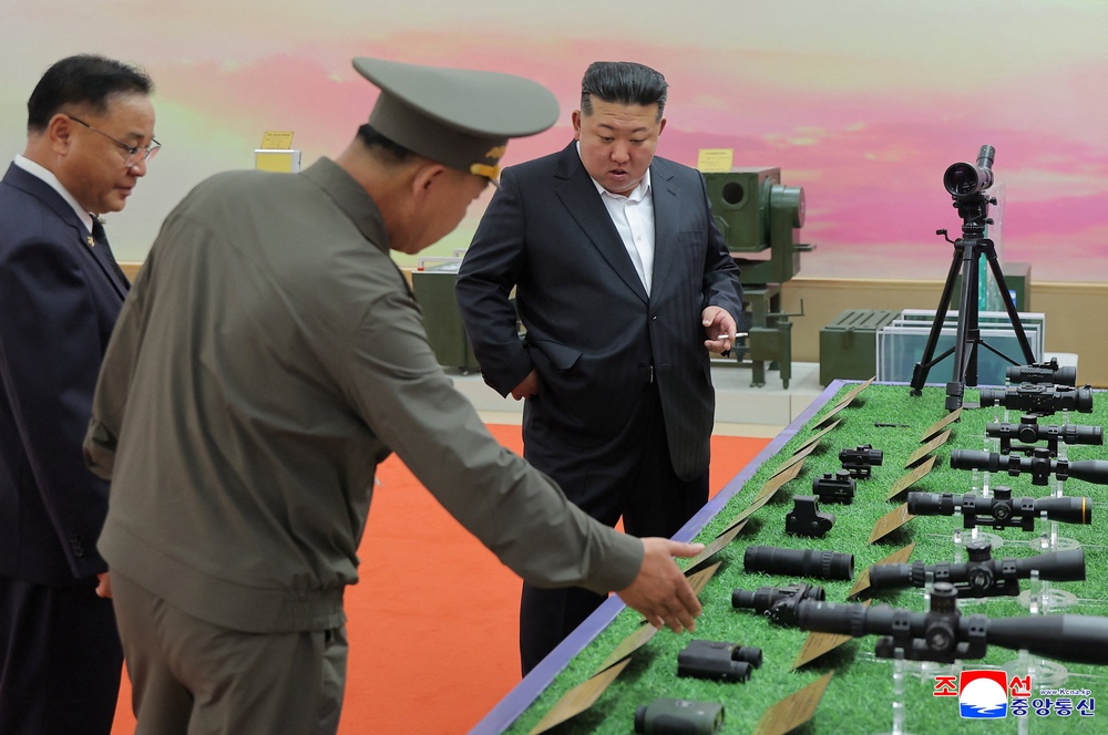 North Korean leader Kim Jong Un attends the opening ceremony of the National Defense Revolution Museum of the Second Economic Committee, North Korea (Reuters)