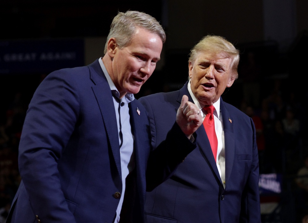 ‘I'm standing over here, and I don't do this with men very often. I started examining [Husted’s] body because I didn't know he was a great athlete...I looked at his a**, and I looked at the whole, and then I looked at his hands,’ Trump told his supporters Monday night in Youngstown (Getty Images)