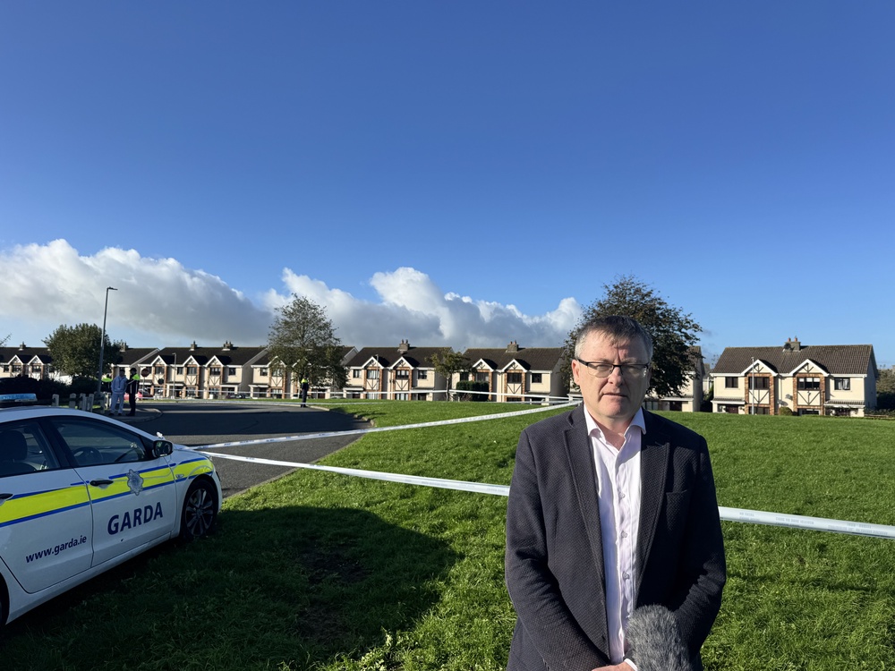 Sinn Féin TD for Waterford David Cullinane speaking at the scene of an overnight fire in the Birchwood estate in Waterford City (Mícheál Ó Scannáil/PA) (PA Wire)