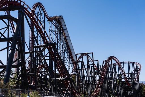 The X2 roller coaster (pictured) at Six Flags Magic Mountain has closed after the park was hit with a flurry of lawsuits alleging that it caused traumatic brain injuries (AP)