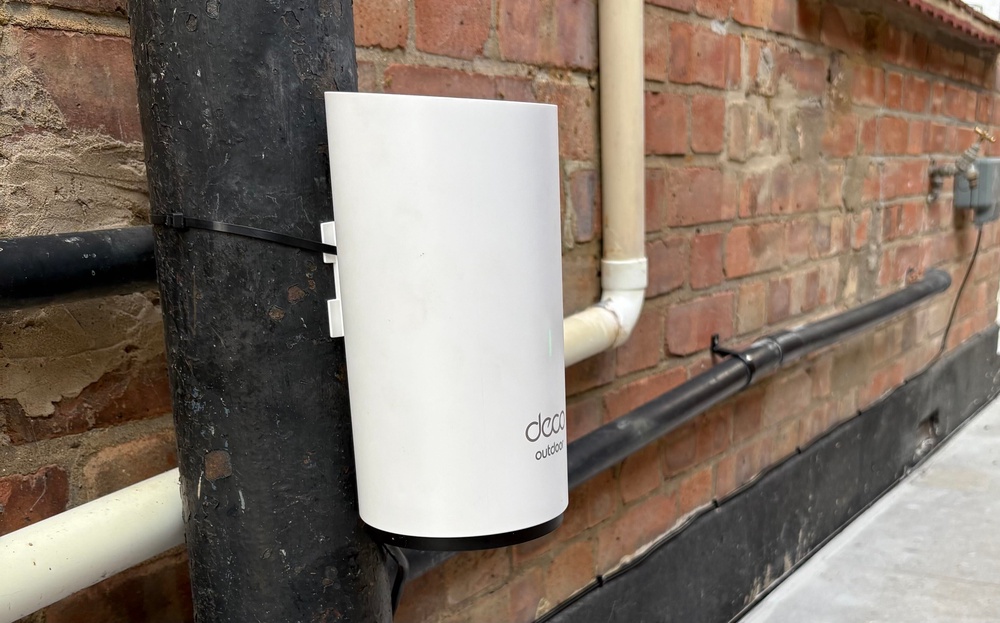 I plugged the outdoor router into my weatherproof sockets, secured the cable along the wall and tied it onto a pipe using zip ties – white zip ties came with the unit, but I used black ones to keep with the colour of the pipe (Jake Brigstock, The Independent)